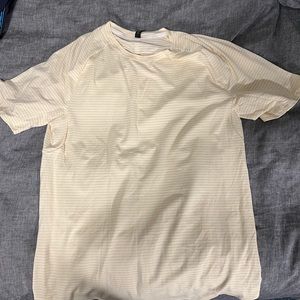Light yellow lululemon shirt. Worn one time size large